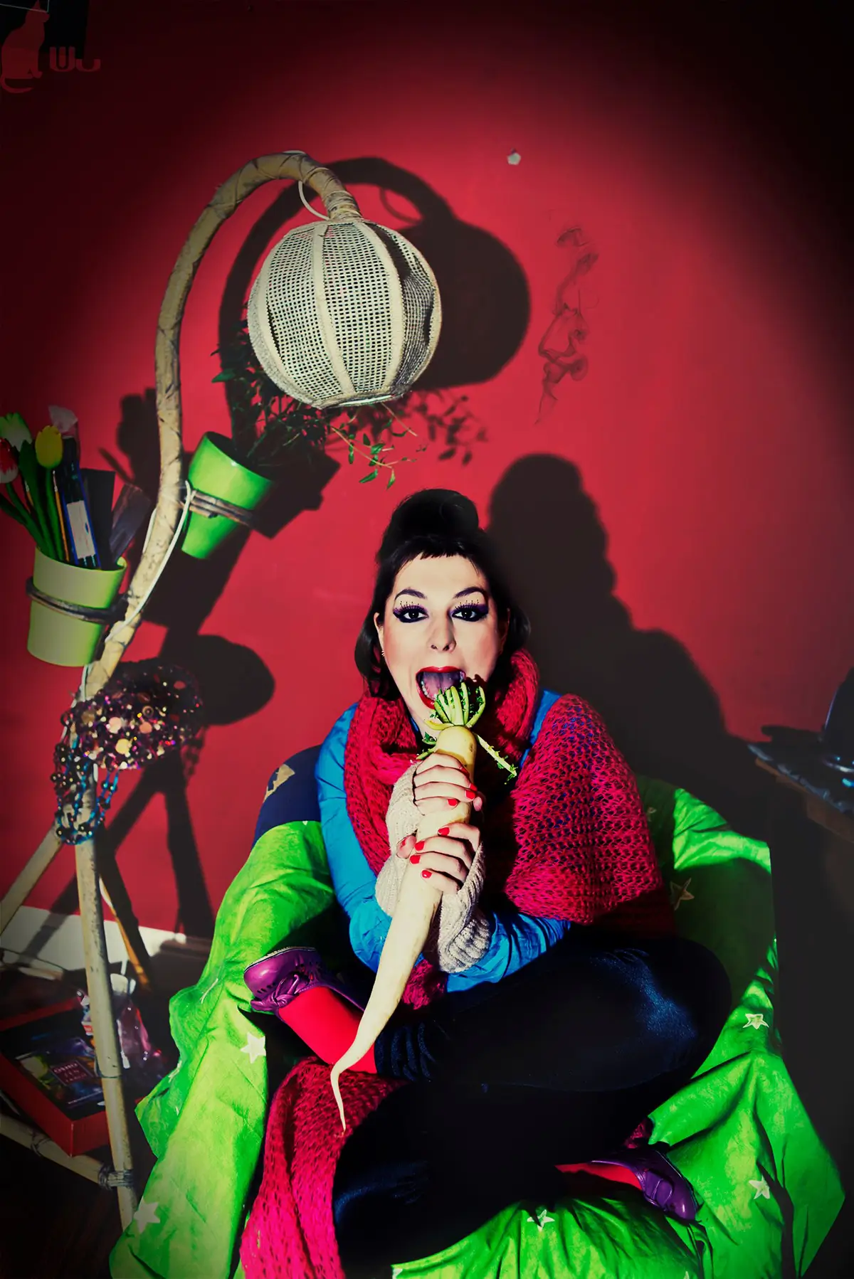 Colourful backgroud, picture of a dark-hair woman eating a large white radish. 