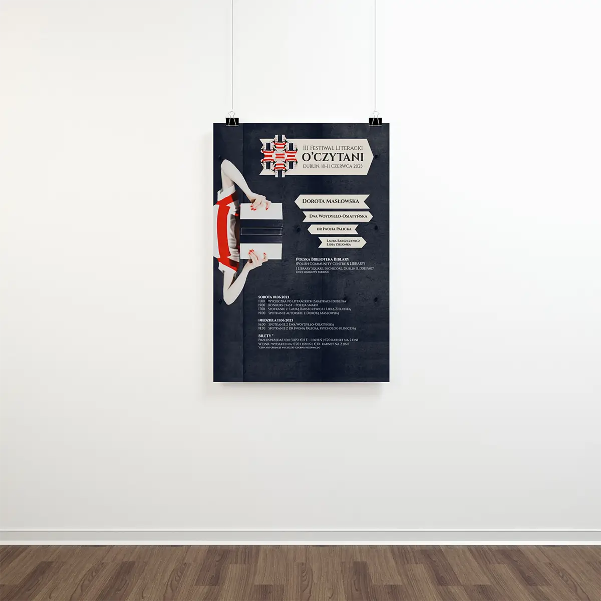 Poster hanging on a white wall. 